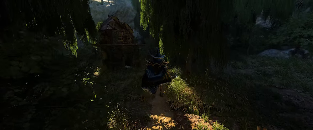 Enshrouded player using a wand while moving through a dense forest, with a small structure visible among the trees.
