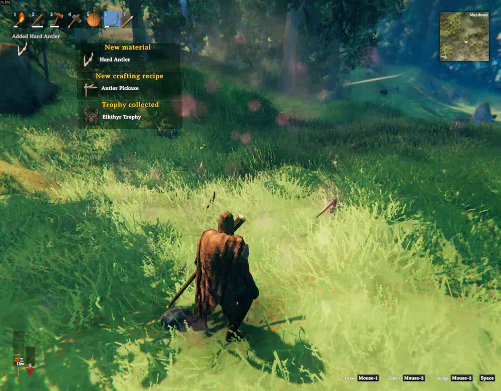 Valheim notifications showing the Hard Antler, Antler Pickaxe recipe, and Eikthyr Trophy after defeating Eikthyr.