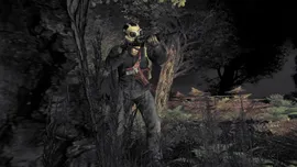 A DayZ survivor wearing a gas mask and tactical gear aims a rifle in a dark, overgrown forest at night.