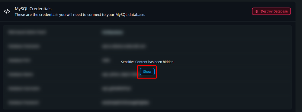 Screenshot showing blurred MySQL credentials with a