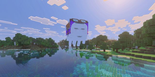 A blocky, Ghast with sunglasses floats above a serene lake surrounded by trees under a bright, partly cloudy sky.