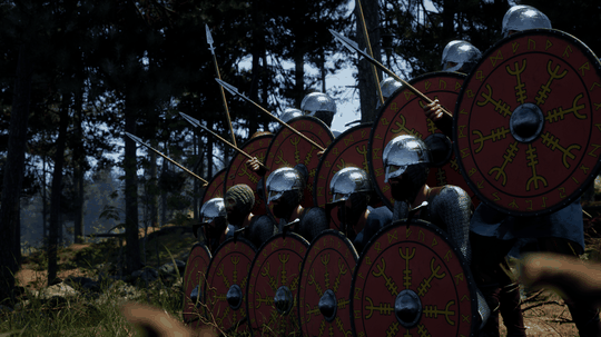 A group of medieval soldiers in armor and helmets, holding shields with red designs, stand in formation with spears in a forested area.