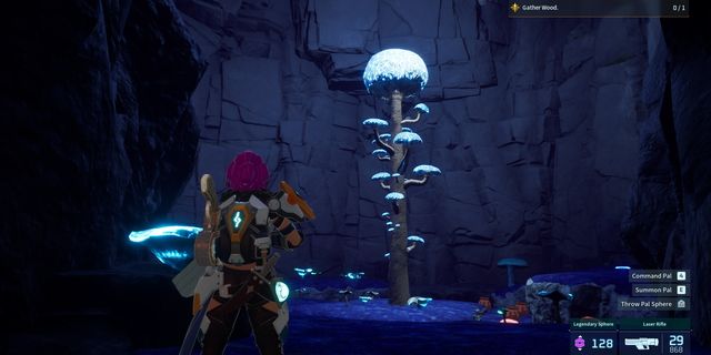 A character with pink hair stands in a cave, facing a glowing, tall mushroom with smaller mushrooms on its stem. Game interface visible.