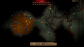 Pixelated game scene with a character exploring a cave. Brightly lit area with items on the left; dark, web-filled area with tracks on the right.