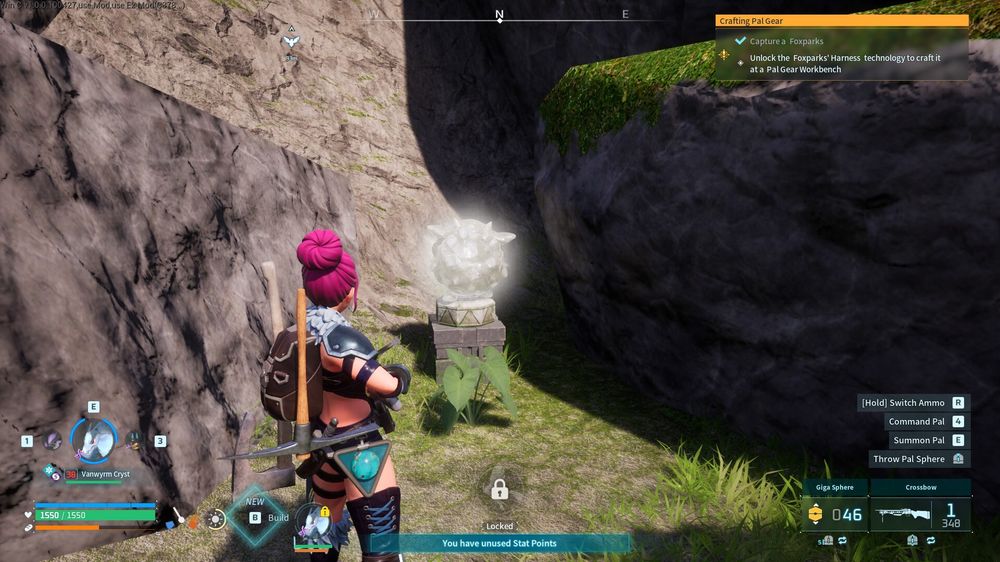 A glowing Pal Effigy tucked between large rock formations. Collecting Pal Effigies increases your power after offering them at a Statue of Power.