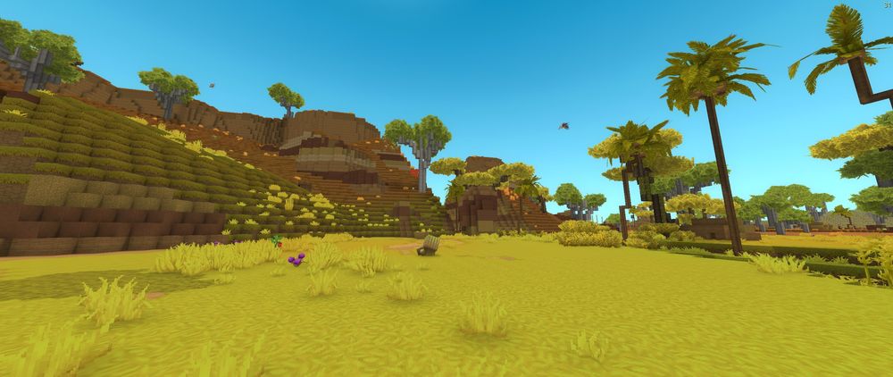Golden Steppes biome in Hytale featuring dry grasslands, warm lighting, and scattered trees across open terrain.