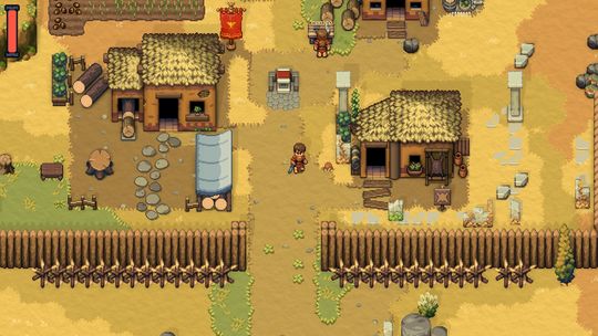 Top-down pixel-art gameplay screenshot from Romestead showing a developed village layout with thatched-roof houses, storage chests, structured stone pathways, and wooden fences surrounding a grassy lawn.