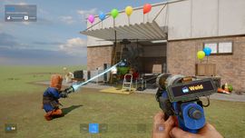 A first-person view in s&box showing a player using the Weld tool on a structure decorated with colorful balloons, demonstrating the game's physics-based building mechanics.