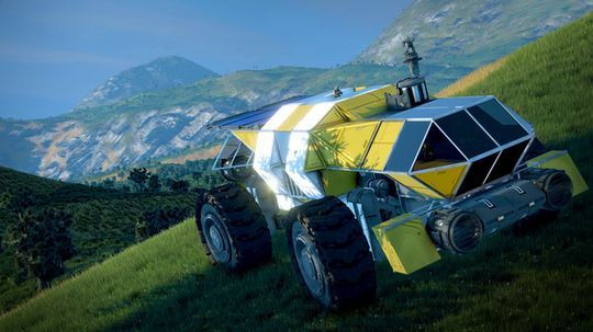 A yellow and white multi-wheeled planetary rover driving across a lush green hillside toward a valley and distant mountains in Space Engineers.