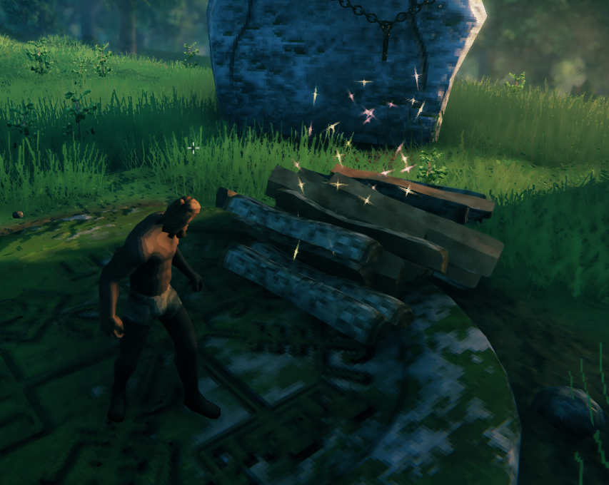 A stack of spawned wood items on the ground in Valheim after using the spawn command through the in-game console.